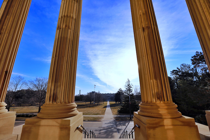view of Beardshear and central campus through the pillars of Curtiss